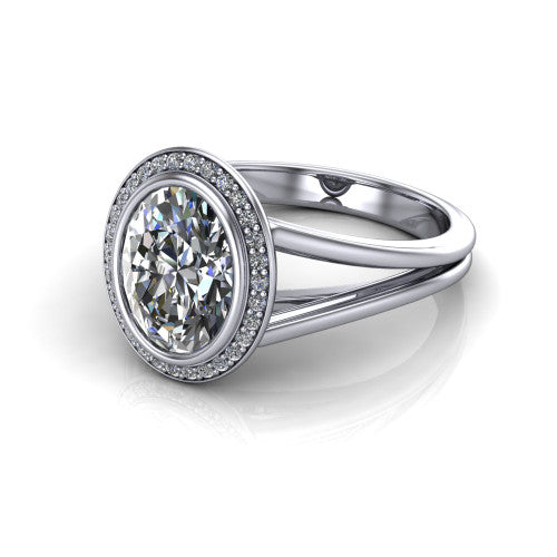Tatum oval halo engagement ring in 14K White Gold, three-quarter perspective showing the haloed center raised above an open polished split shank
