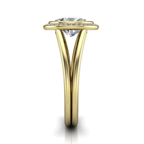 Tatum oval halo engagement ring in 14K Yellow Gold, side profile showing the polished split shank dividing into two slim rails beneath the halo