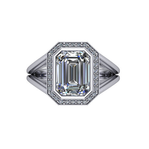 Tatum emerald halo engagement ring in 14K White Gold, top-down view showing the center diamond framed by a pav&eacute; halo where the split shank rails meet the head