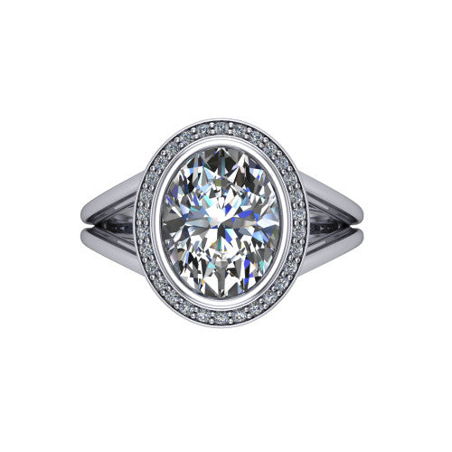 Tatum oval halo engagement ring in 14K White Gold, top-down view showing the center diamond framed by a pav&eacute; halo where the split shank rails meet the head