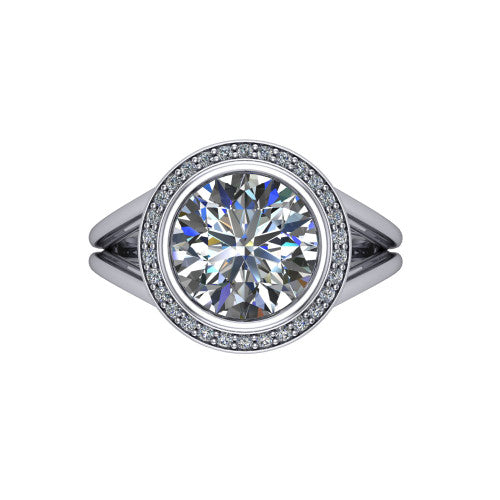 Tatum round halo engagement ring in 14K White Gold, top-down view showing the center diamond framed by a pav&eacute; halo where the split shank rails meet the head