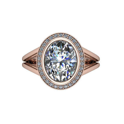 Tatum oval halo engagement ring in 18K Rose Gold, top-down view showing the center diamond framed by a pav&eacute; halo where the split shank rails meet the head