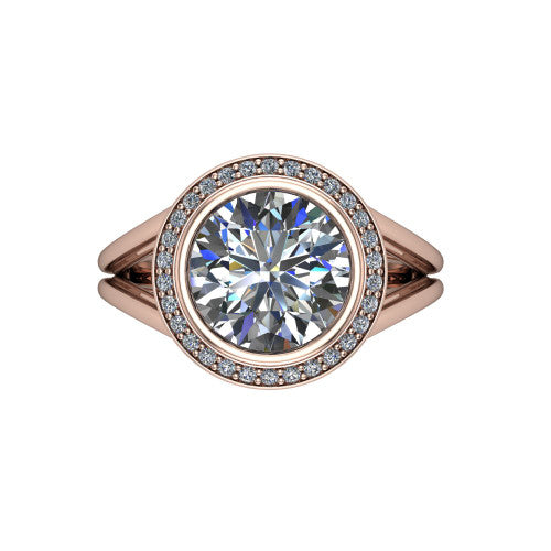 Tatum round halo engagement ring in 18K Rose Gold, top-down view showing the center diamond framed by a pav&eacute; halo where the split shank rails meet the head