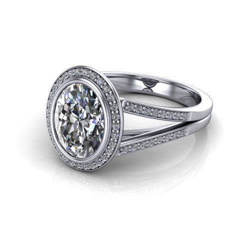 Daphne oval halo engagement ring in 18K White Gold, three-quarter perspective showing the haloed center raised above a pav&eacute; split shank