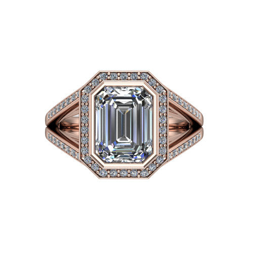 Daphne emerald halo engagement ring in 14K Rose Gold, top-down view showing the center diamond framed by a pav&eacute; halo where the split shank meets the head