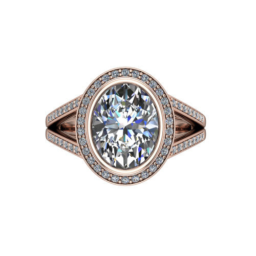 Daphne oval halo engagement ring in 14K Rose Gold, top-down view showing the center diamond framed by a pav&eacute; halo where the split shank meets the head