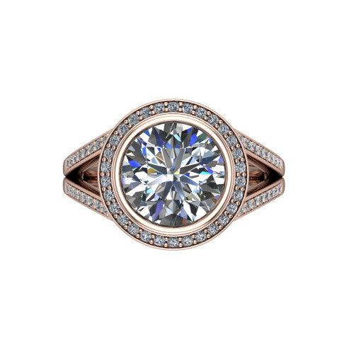 Daphne round halo engagement ring in 14K Rose Gold, top-down view showing the center diamond framed by a pav&eacute; halo where the split shank meets the head