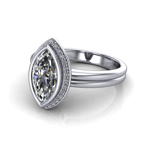 Maggie marquise halo engagement ring in 14K White Gold, three-quarter perspective showing the bezel-set center framed by a pav&eacute; halo on a polished double-rail shank