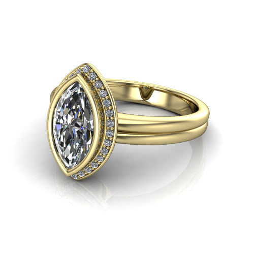Maggie marquise halo engagement ring in 14K Yellow Gold, three-quarter perspective showing the bezel-set center framed by a pav&eacute; halo on a polished double-rail shank