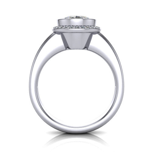 Maggie oval halo engagement ring in Platinum, through-finger front profile showing the haloed center raised above the polished double-rail band