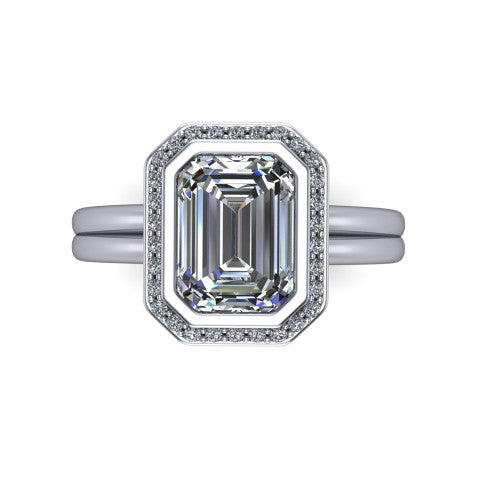 Maggie emerald halo engagement ring in Platinum, top-down view showing the center diamond ringed by the pav&eacute; halo and bezel frame