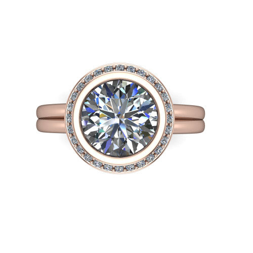 Maggie round halo engagement ring in 18K Rose Gold, top-down view showing the center diamond ringed by the pav&eacute; halo and bezel frame