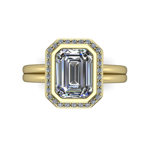 Maggie emerald halo engagement ring in 18K Yellow Gold, top-down view showing the center diamond ringed by the pav&eacute; halo and bezel frame