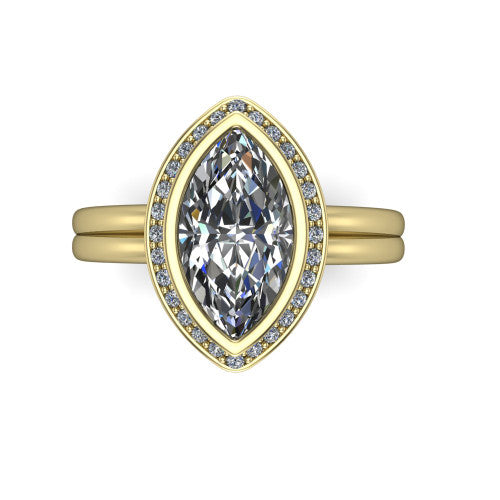 Maggie marquise halo engagement ring in 18K Yellow Gold, top-down view showing the center diamond ringed by the pav&eacute; halo and bezel frame