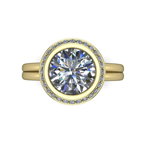 Maggie round halo engagement ring in 18K Yellow Gold, top-down view showing the center diamond ringed by the pav&eacute; halo and bezel frame