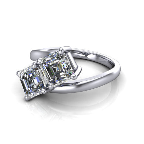 Adelaide asscher three stone engagement ring in Platinum, three-quarter perspective showing two diamonds set corner to corner on a slim polished bypass band