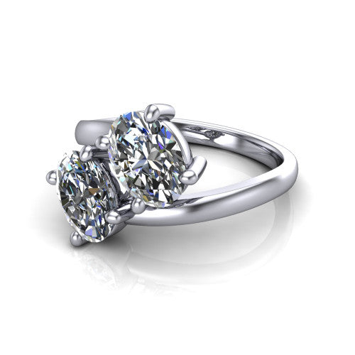 Adelaide oval three stone engagement ring in 18K White Gold, three-quarter perspective showing two diamonds set corner to corner on a slim polished bypass band