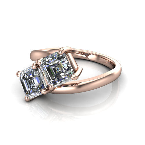 Adelaide asscher three stone engagement ring in 14K Rose Gold, three-quarter perspective showing two diamonds set corner to corner on a slim polished bypass band
