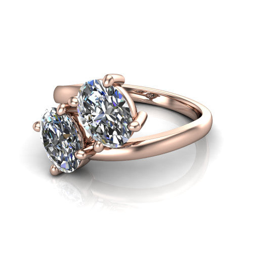 Adelaide oval three stone engagement ring in 18K Rose Gold, three-quarter perspective showing two diamonds set corner to corner on a slim polished bypass band