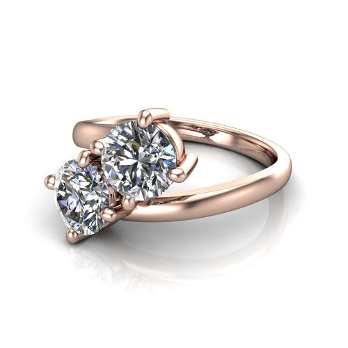 Adelaide round three stone engagement ring in 14K Rose Gold, three-quarter perspective showing two diamonds set corner to corner on a slim polished bypass band