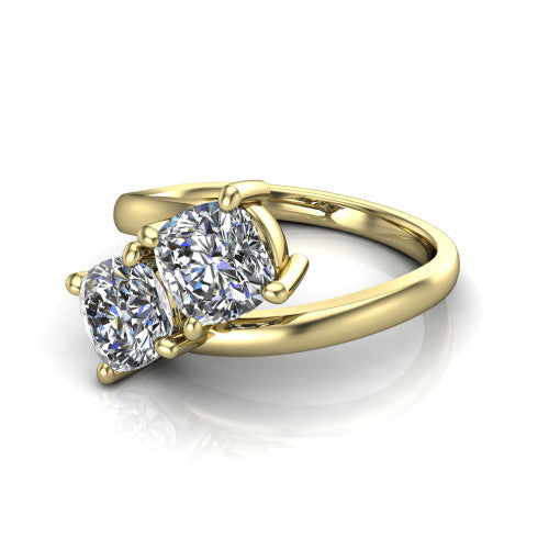 Adelaide cushion three stone engagement ring in 18K Yellow Gold, three-quarter perspective showing two diamonds set corner to corner on a slim polished bypass band