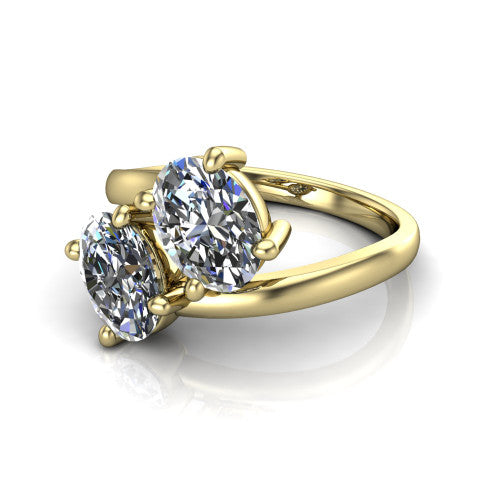 Adelaide oval three stone engagement ring in 14K Yellow Gold, three-quarter perspective showing two diamonds set corner to corner on a slim polished bypass band