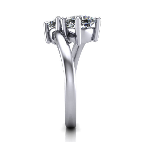 Adelaide cushion three stone engagement ring in 18K White Gold, side profile showing the slim single bypass band swirling beneath the two-stone head