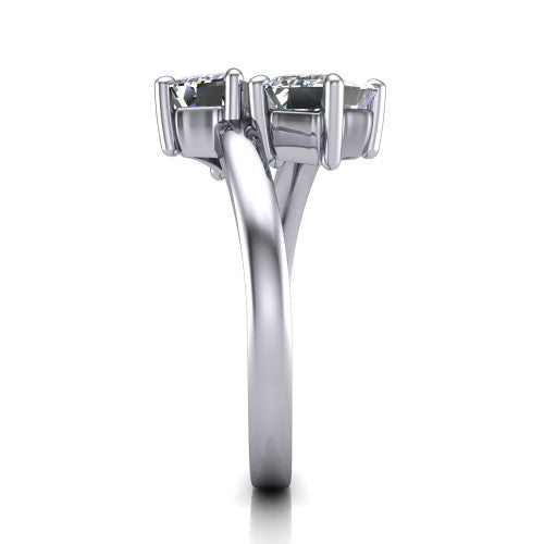 Adelaide emerald three stone engagement ring in 18K White Gold, side profile showing the slim single bypass band swirling beneath the two-stone head