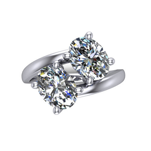 Adelaide oval three stone engagement ring in 18K White Gold, top-down view showing the two diamonds in a toi et moi arrangement above the slim bypass band