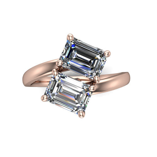 Adelaide emerald three stone engagement ring in 14K Rose Gold, top-down view showing the two diamonds in a toi et moi arrangement above the slim bypass band