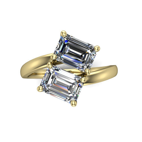 Adelaide emerald three stone engagement ring in 18K Yellow Gold, top-down view showing the two diamonds in a toi et moi arrangement above the slim bypass band
