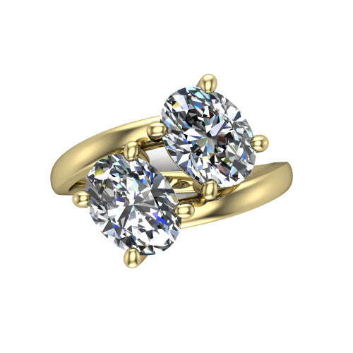 Adelaide oval three stone engagement ring in 18K Yellow Gold, top-down view showing the two diamonds in a toi et moi arrangement above the slim bypass band