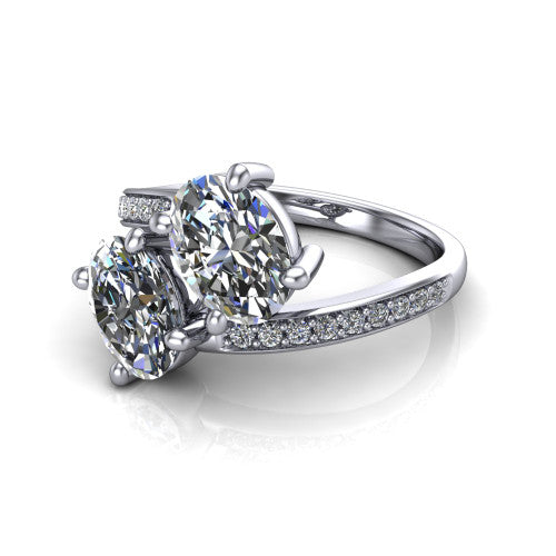 Payton oval three stone engagement ring in 14K White Gold, three-quarter perspective showing two diamonds set corner to corner above a pav&eacute; bypass split shank