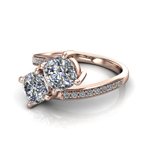 Payton cushion three stone engagement ring in 18K Rose Gold, three-quarter perspective showing two diamonds set corner to corner above a pav&eacute; bypass split shank