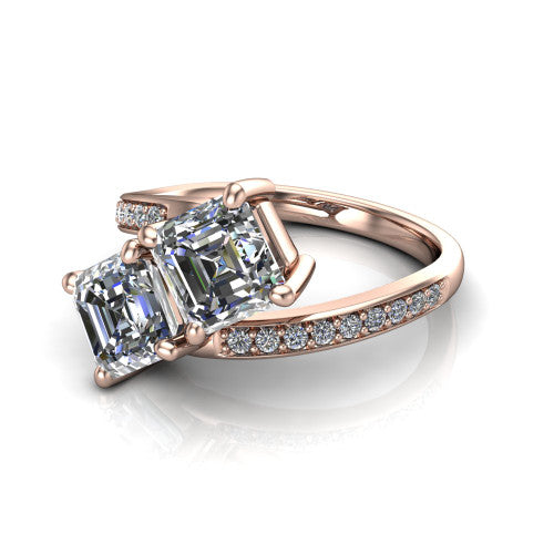 Payton asscher three stone engagement ring in 18K Rose Gold, three-quarter perspective showing two diamonds set corner to corner above a pav&eacute; bypass split shank