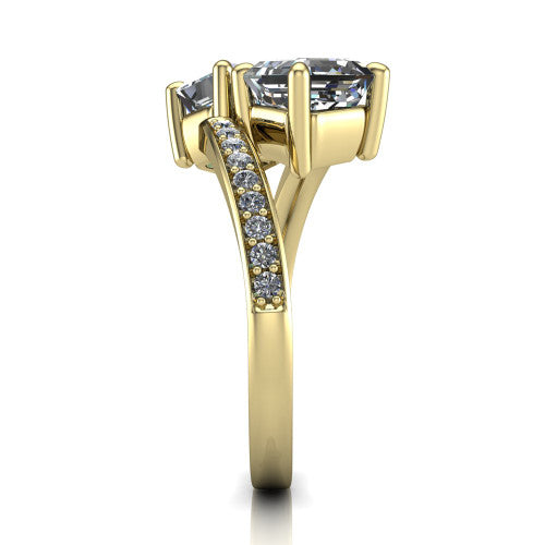 Payton asscher three stone engagement ring in 14K Yellow Gold, side profile showing the pav&eacute; split shank crossing in a bypass beneath the two-stone head