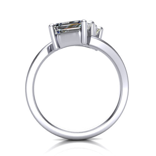 Payton emerald three stone engagement ring in Platinum, through-finger front profile showing the two-stone head raised above the pav&eacute; split band
