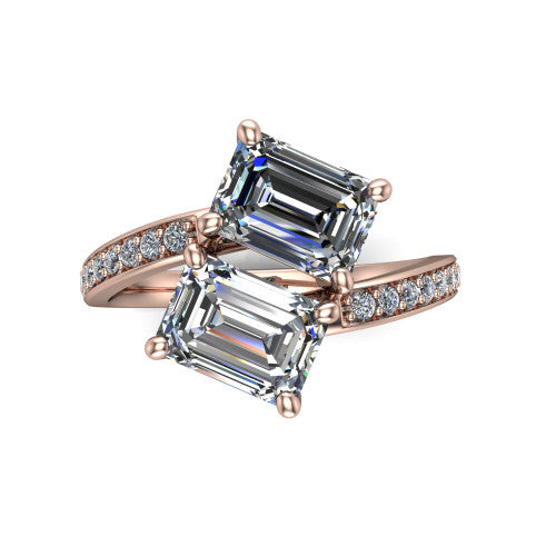 Payton emerald three stone engagement ring in 14K Rose Gold, top-down view showing the two diamonds in a toi et moi arrangement where the pav&eacute; split rails meet the head