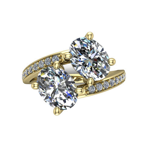 Payton oval three stone engagement ring in 14K Yellow Gold, top-down view showing the two diamonds in a toi et moi arrangement where the pav&eacute; split rails meet the head