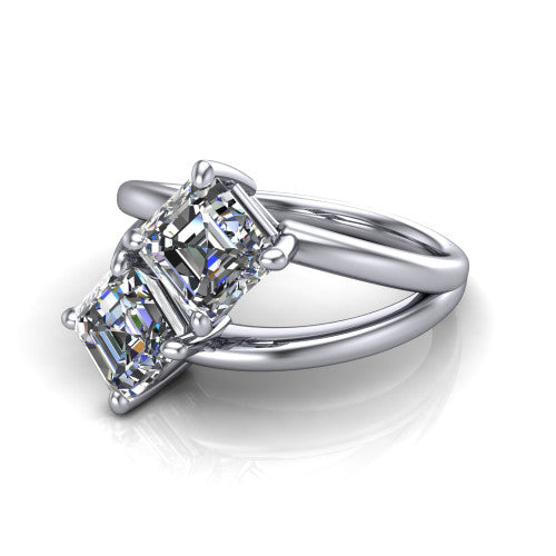 Michelle asscher three stone engagement ring in Platinum, three-quarter perspective showing two diamonds set corner to corner above an open polished split shank