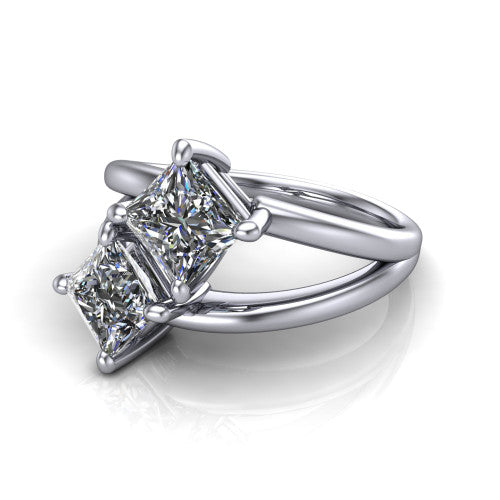 Michelle princess three stone engagement ring in Platinum, three-quarter perspective showing two diamonds set corner to corner above an open polished split shank