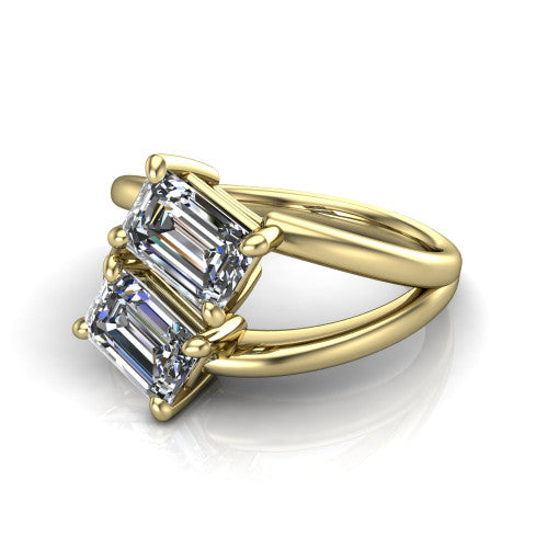 Michelle emerald three stone engagement ring in 14K Yellow Gold, three-quarter perspective showing two diamonds set corner to corner above an open polished split shank