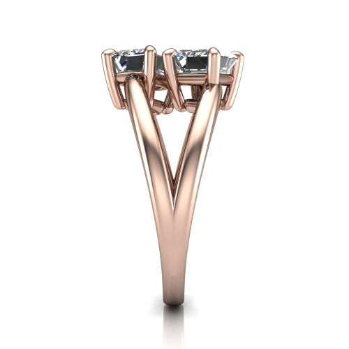 Michelle emerald three stone engagement ring in 18K Rose Gold, side profile showing the polished split shank dividing into two rails beneath the two-stone head