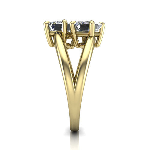 Michelle emerald three stone engagement ring in 14K Yellow Gold, side profile showing the polished split shank dividing into two rails beneath the two-stone head