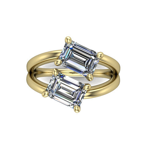 Michelle emerald three stone engagement ring in 14K Yellow Gold, top-down view showing the two diamonds in a toi et moi arrangement where the split shank rails meet the head