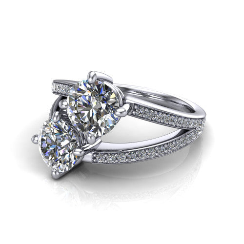 Malani round three stone engagement ring in Platinum, three-quarter perspective showing two diamonds set corner to corner above a pav&eacute; split shank
