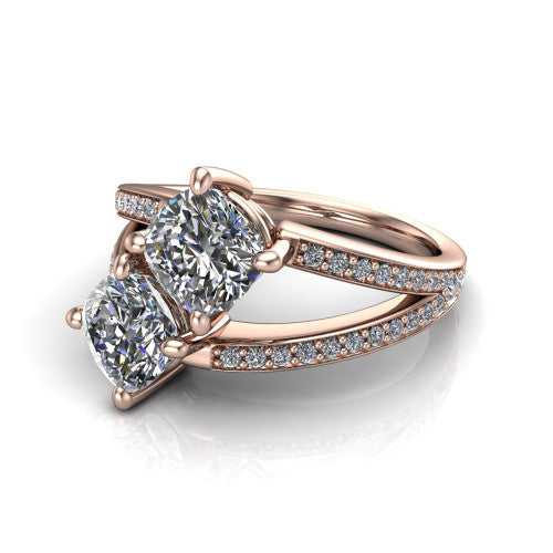 Malani cushion three stone engagement ring in 18K Rose Gold, three-quarter perspective showing two diamonds set corner to corner above a pav&eacute; split shank