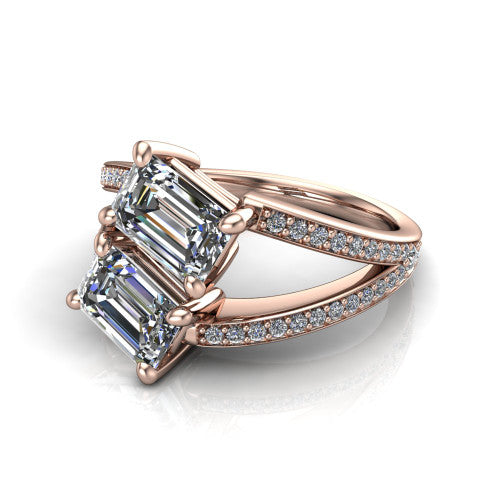 Malani emerald three stone engagement ring in 18K Rose Gold, three-quarter perspective showing two diamonds set corner to corner above a pav&eacute; split shank