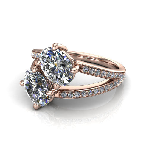 Malani oval three stone engagement ring in 18K Rose Gold, three-quarter perspective showing two diamonds set corner to corner above a pav&eacute; split shank