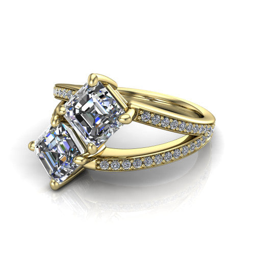 Malani asscher three stone engagement ring in 18K Yellow Gold, three-quarter perspective showing two diamonds set corner to corner above a pav&eacute; split shank